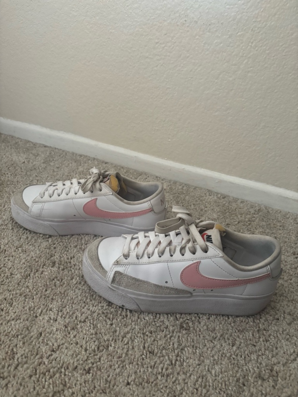 Nike Women’s White Sneakers with Pink Swoosh